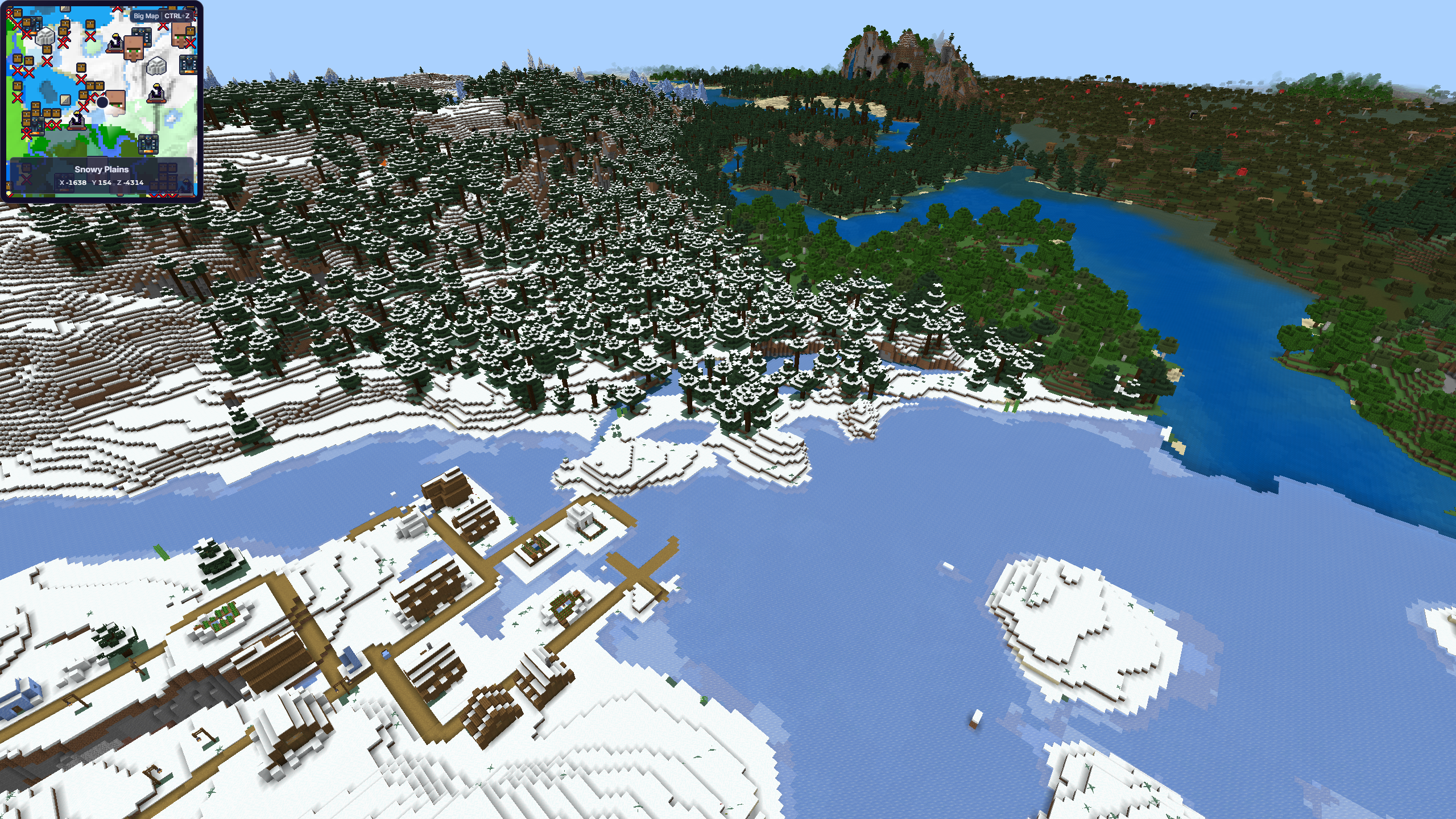 Minecraft terrain showing snowy, forested, mountainous, and lakeside biomes meeting