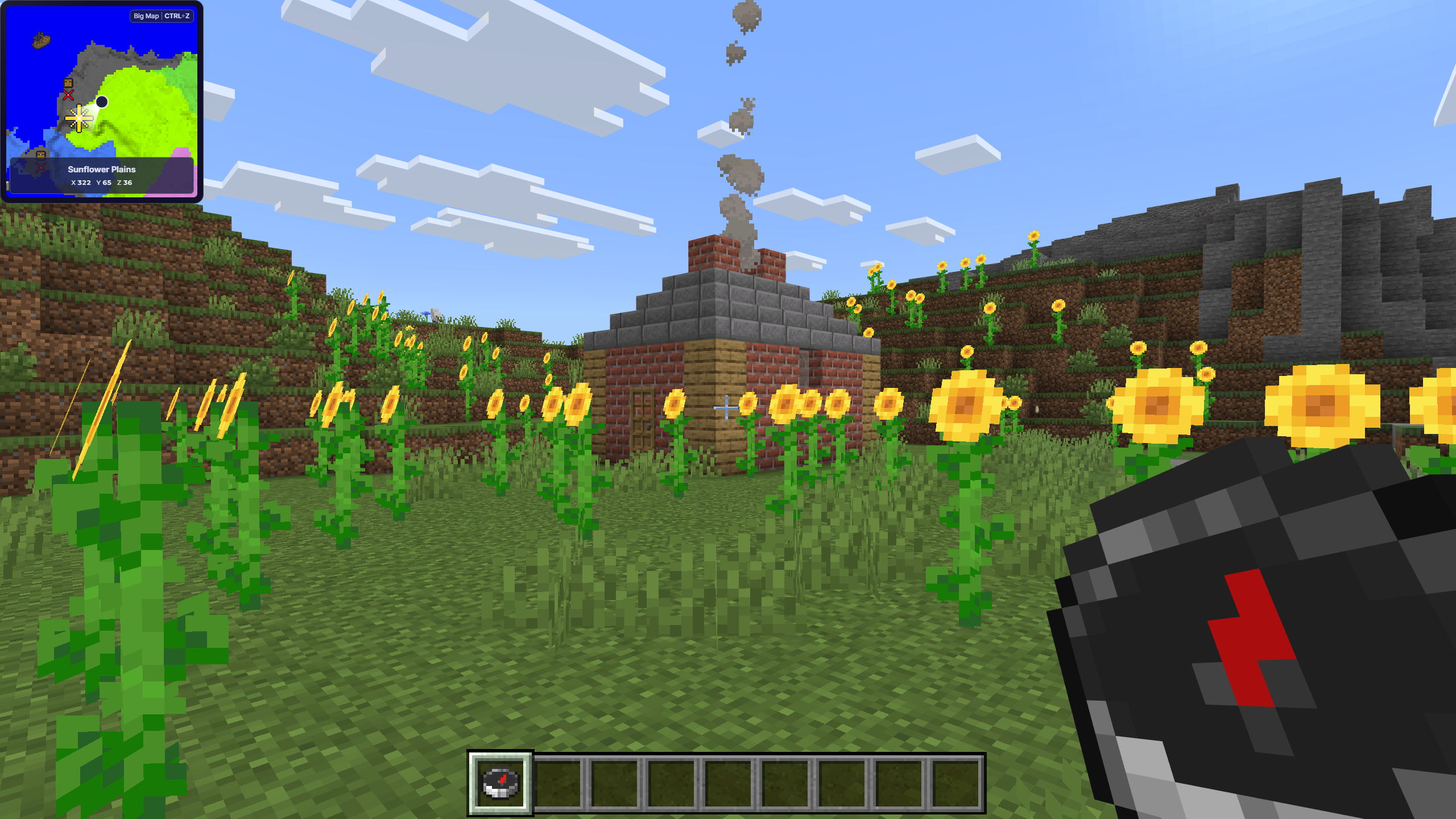 Minecraft player holding a compass near a house in a sunflower field