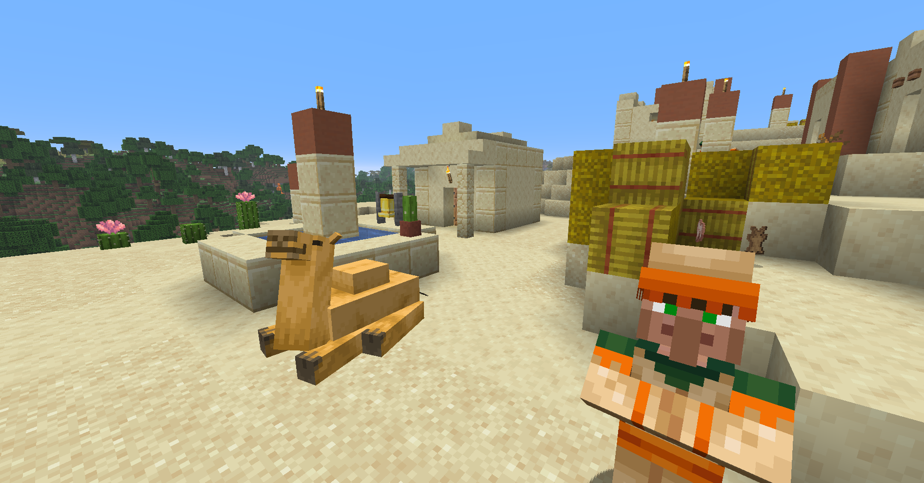 Desert Village with sandstone houses, hay bales, and villagers
